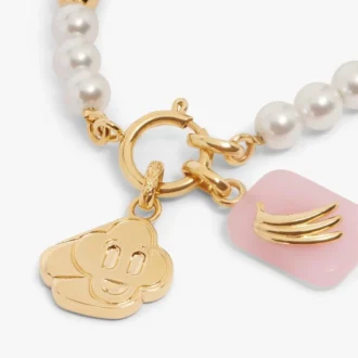 Armband med ikonisk pärla i vitt och guld