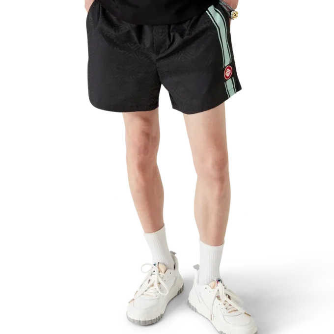 Badshorts med monogram och jacquardränder