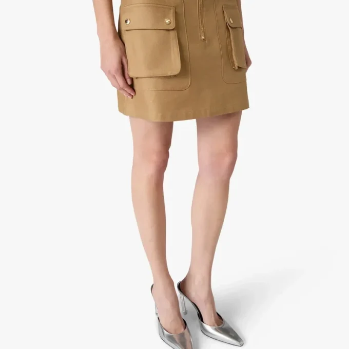 Beige minikjol i bomull med fickor