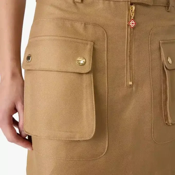 Beige minikjol i bomull med fickor