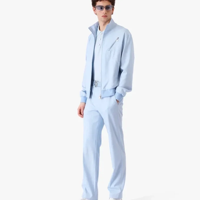 Blå skräddarsydda jacquardbyxor med monogrammönster