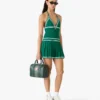 Grön plisserad halterneck-miniklänning
