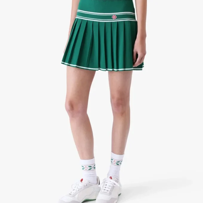 Grön plisserad minikjol i stickat