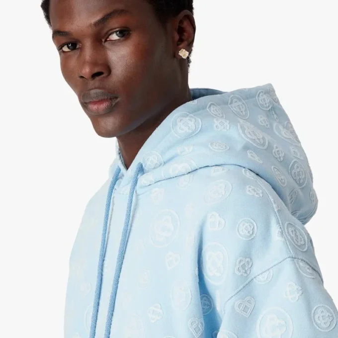 Huvtröja med applikerat monogram