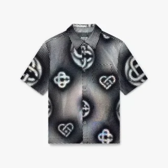 Kortärmad denimskjorta med pärlemorskimrande monogram