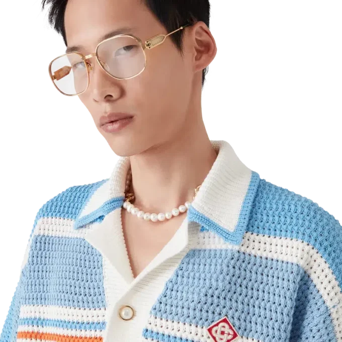 Kortärmad tennisskjorta i bomull med virkad struktur