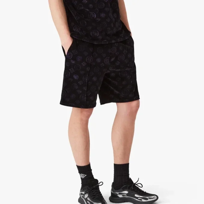Lila velourshorts med monogram