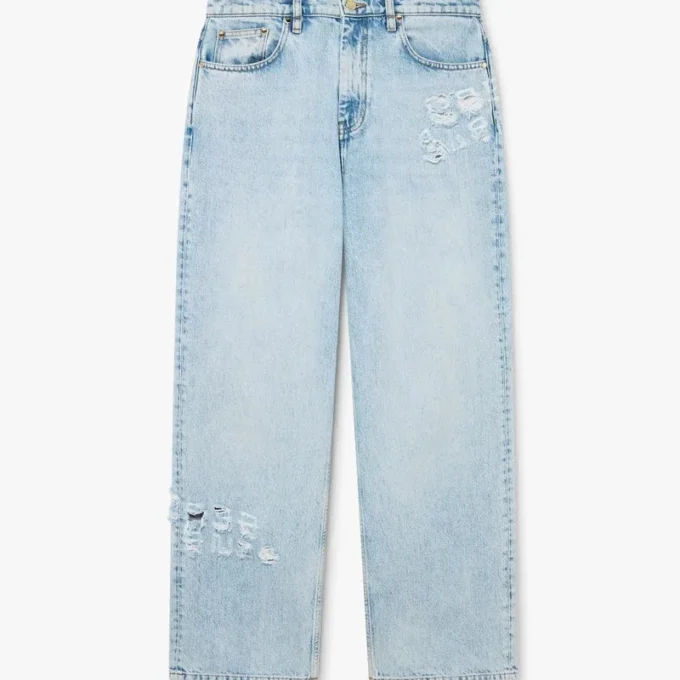 Ljusblå jeans i graffitidesign