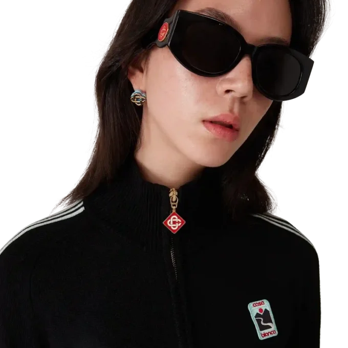 Merino-stickad träningsjacka Merino-stickad träningsjacka