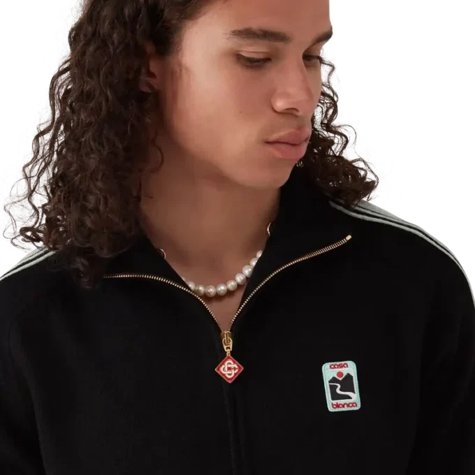 Merino-stickad träningsjacka