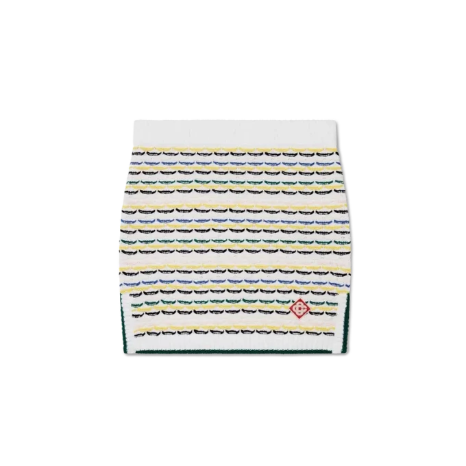 Minikjol i bomullstrikå med tuck-stickning