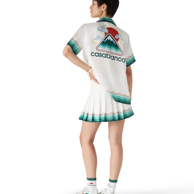 Tennisplisserad minikjol i siden