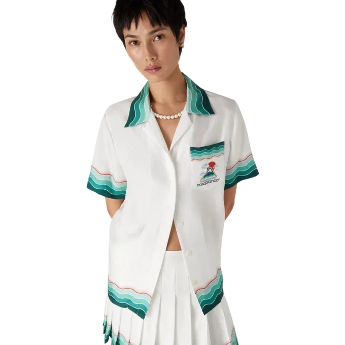 Tennisplisserad minikjol i siden