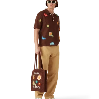 Pikétröja med virkade motiv