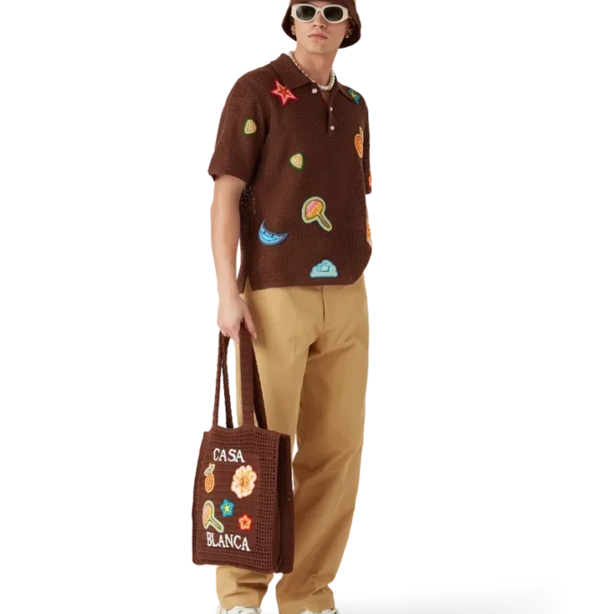 Pikétröja med virkade motiv