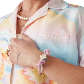 Rosa knutet pärlarmband