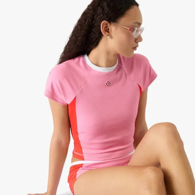 Rosa rash top med korta ärmar och monogram