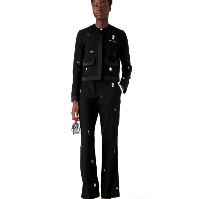 Skräddarsydda byxor i ull med broderat motiv