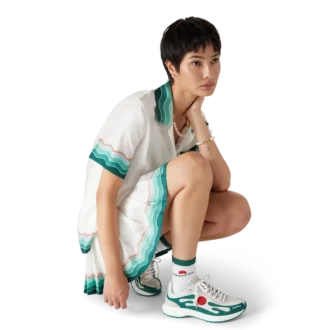 Stade-sneakers för damer i vitt och grönt