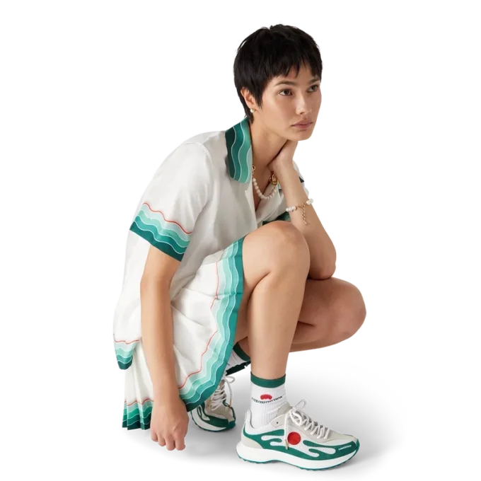 Stade-sneakers för damer i vitt och grönt