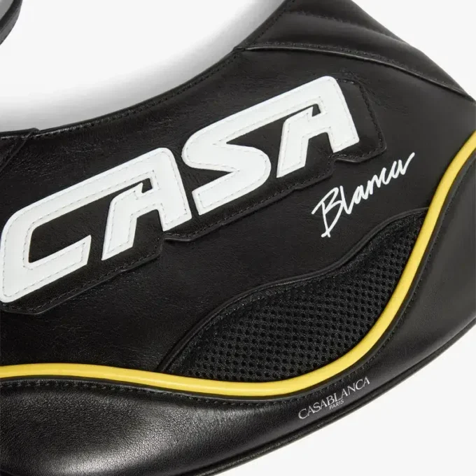 Svart smal biker-väska