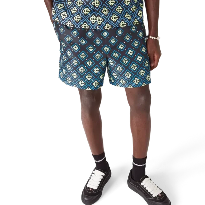 Svarta badshorts med monogram i dégradé