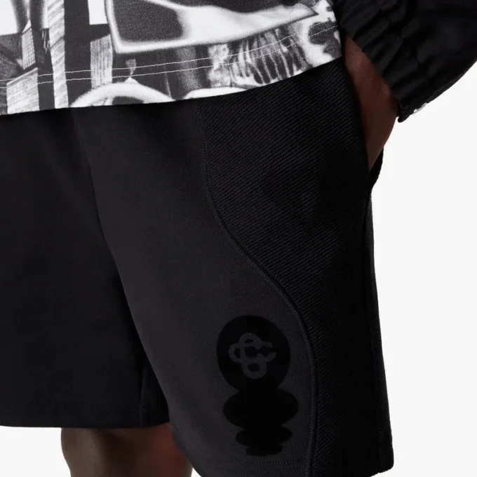 Sweatshorts med flocktryck av Squash-logotypen