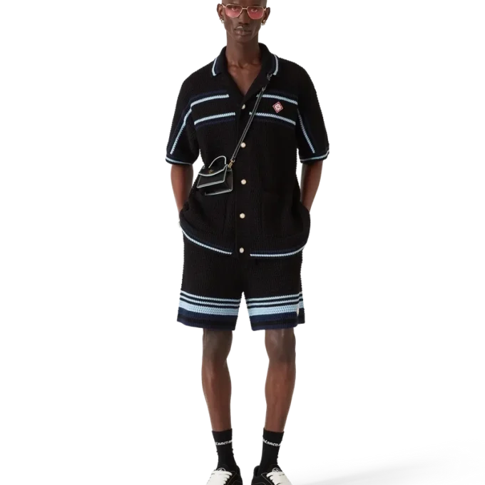 Tennis-skjorta i bomullskrochet med korta ärmar