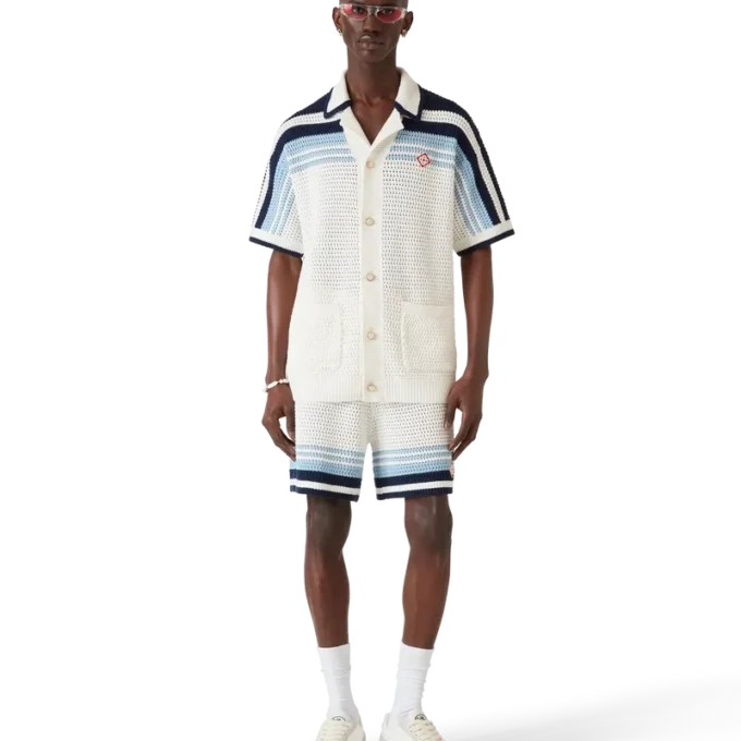 Tennis-skjorta i bomullskrochet med korta ärmar