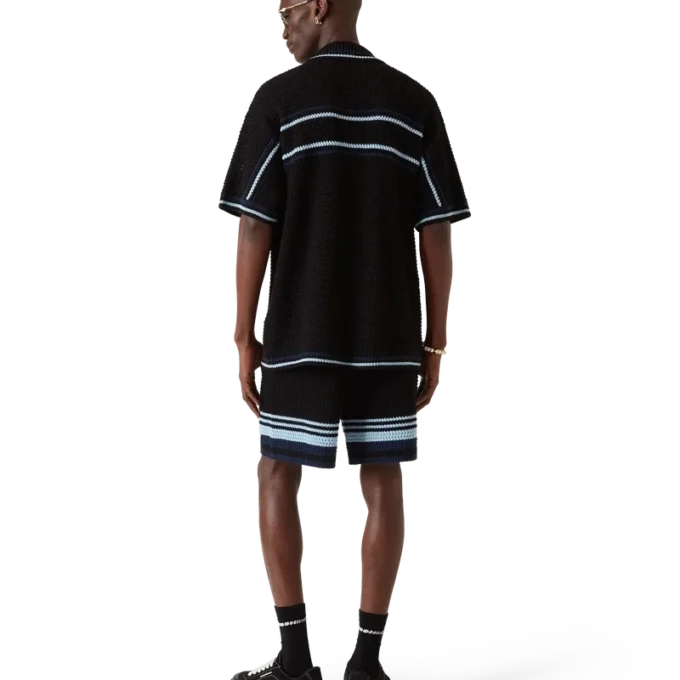 Tennis-skjorta i bomullskrochet med korta ärmar