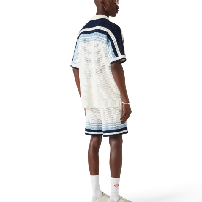 Tennis-skjorta i bomullskrochet med korta ärmar