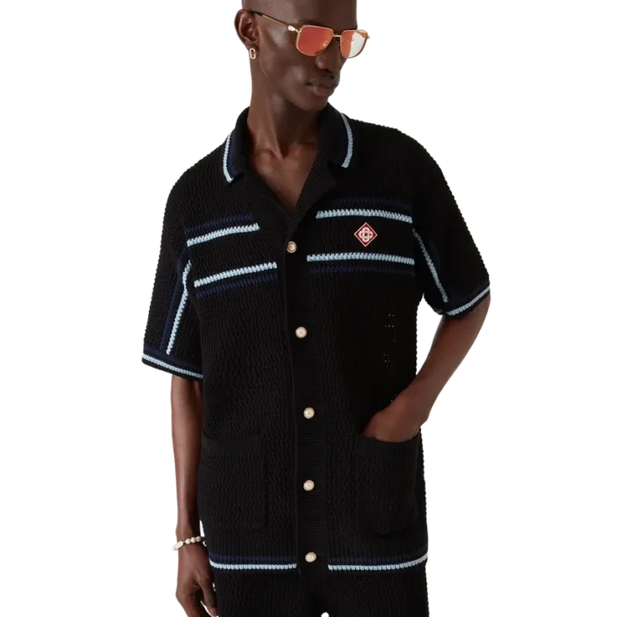 Tennis-skjorta i bomullskrochet med korta ärmar