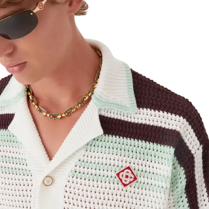 Tennis-skjorta i bomullskrochet med korta ärmar