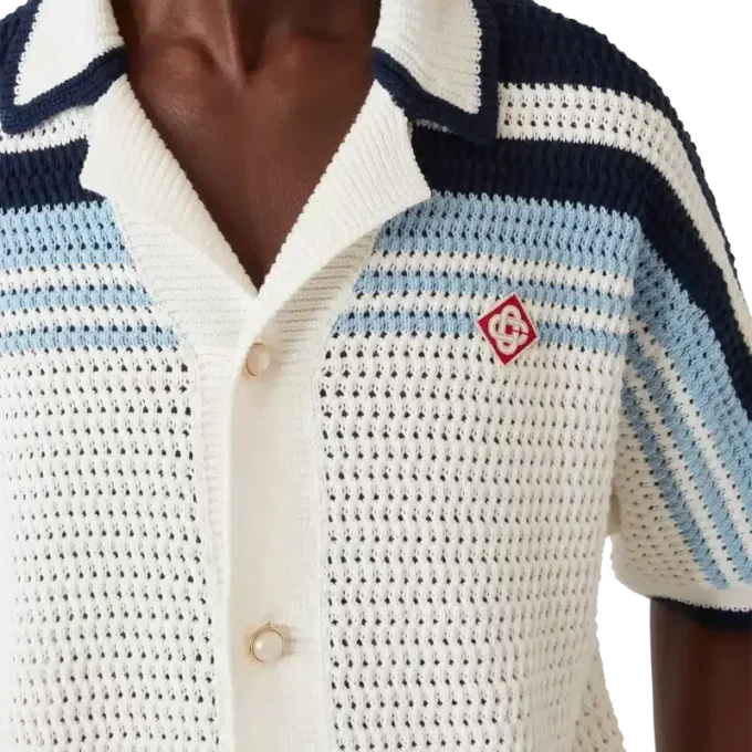 Tennis-skjorta i bomullskrochet med korta ärmar