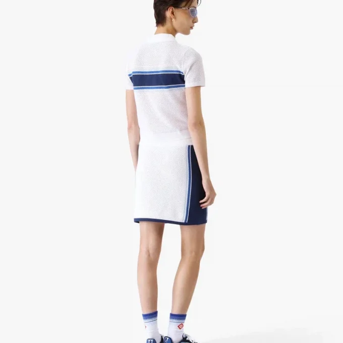 Vit och blårandig mesh-top