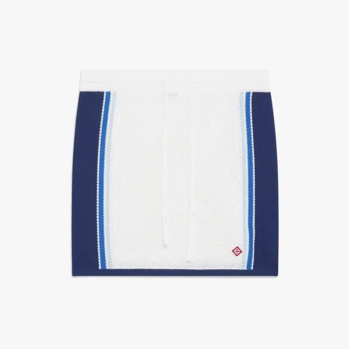 Vit och blårandig minikjol i mesh Vit och blårandig minikjol i mesh