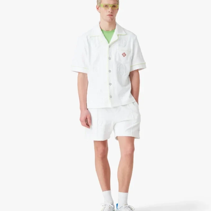 Vita monogramshorts i frotté