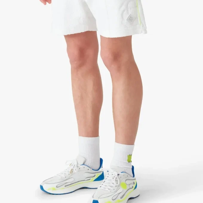 Vita monogramshorts i frotté