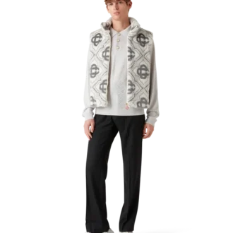 Väst i fuskpäls med monogram