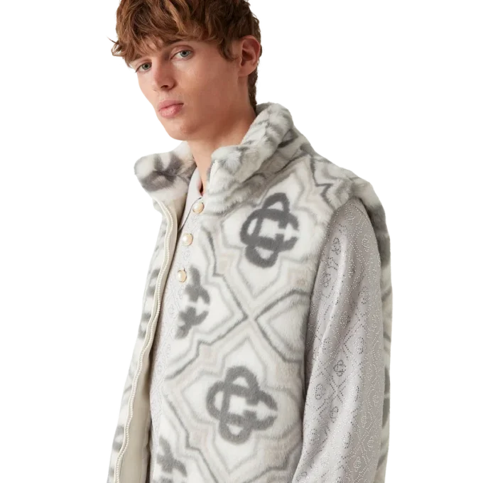 Väst i fuskpäls med monogram